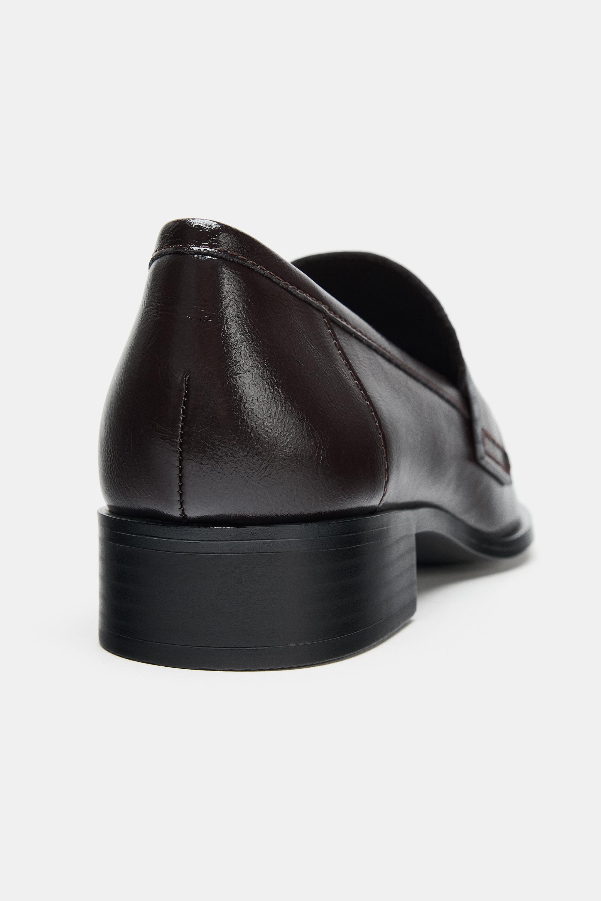 MOCASSINS À CLAUQE MONTANTE